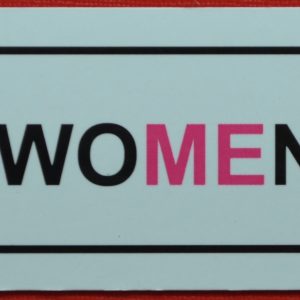 A black and pink magnet with no underline for Treat Women Right.