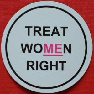 A black white and pink magnet with an underline.