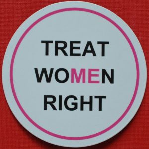 A magnet in pink and black with no underline.