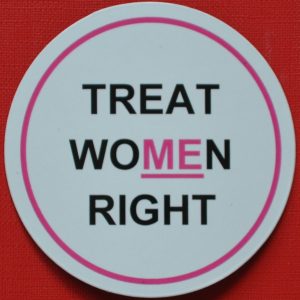 A magnet in pink and black with underline.
