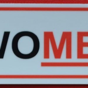 A red rectangle Treat Women Right Sticker.
