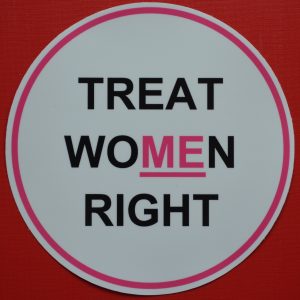 A pink and white bumper sticker for Treat Women Right with an underline.